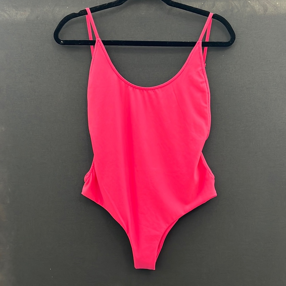 Bright pink modern cut one piece bathing suit